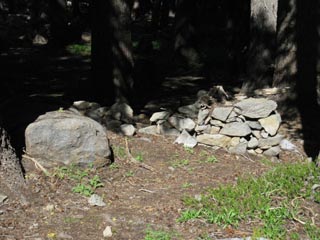 The old stone cabin past the trap and old truck